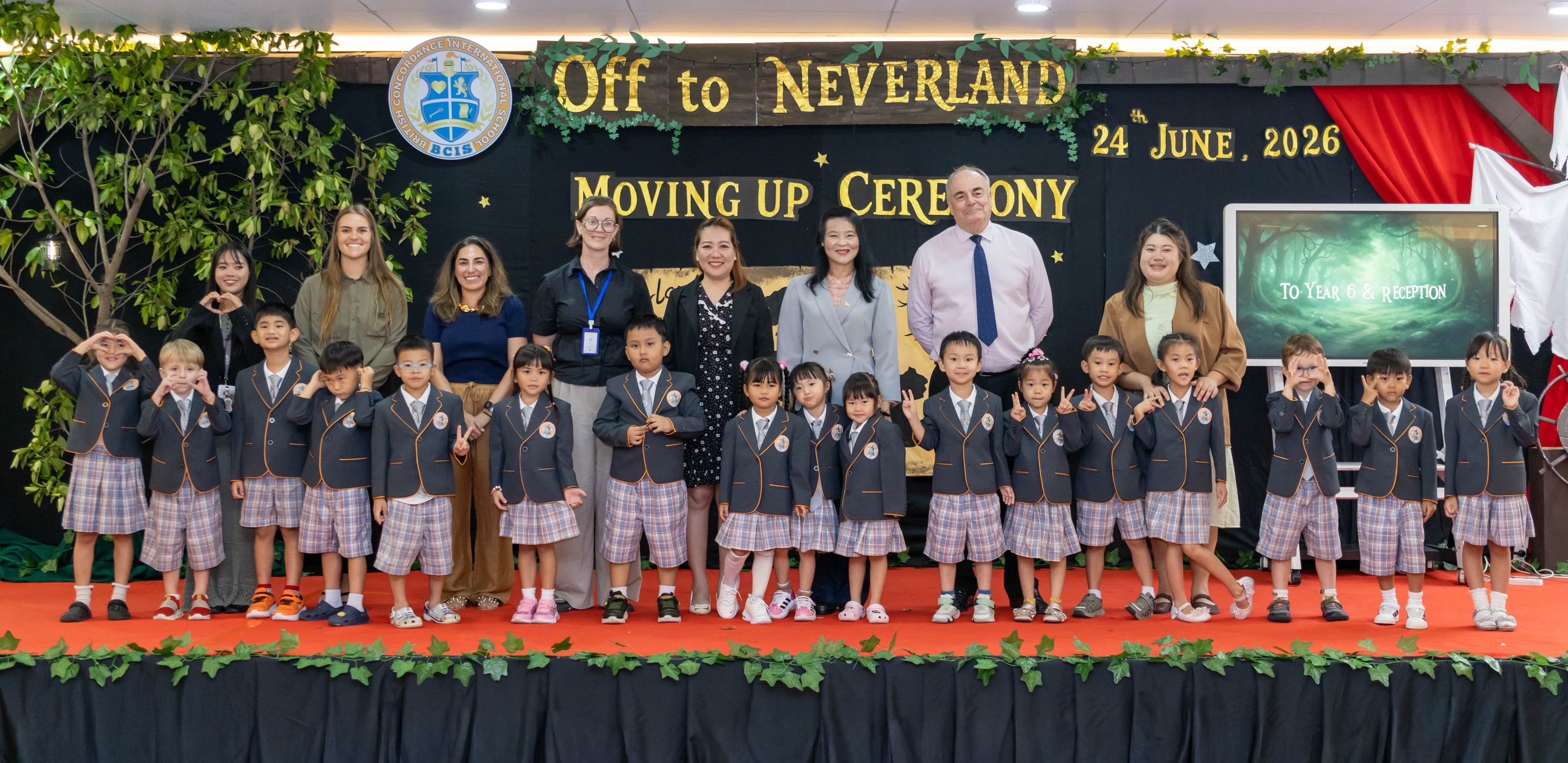 BCIS pupils and staff on stage at the Moving Up Ceremony